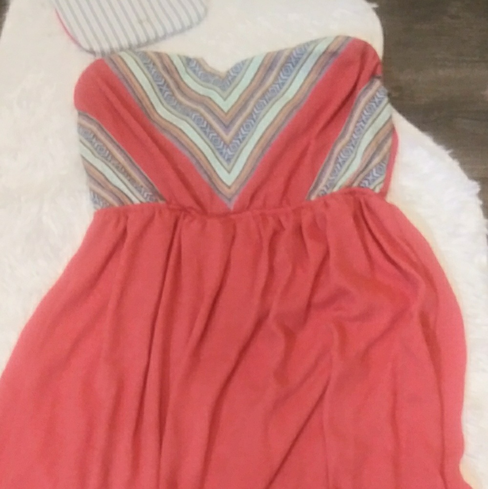 Pink strapless summer dress.